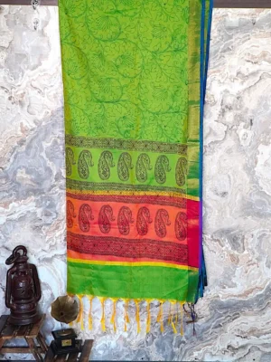 A lime green body with lime green and magenta pallu.
