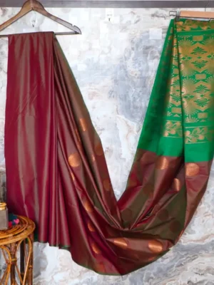 Metallic brownish-maroon with green pallu.
